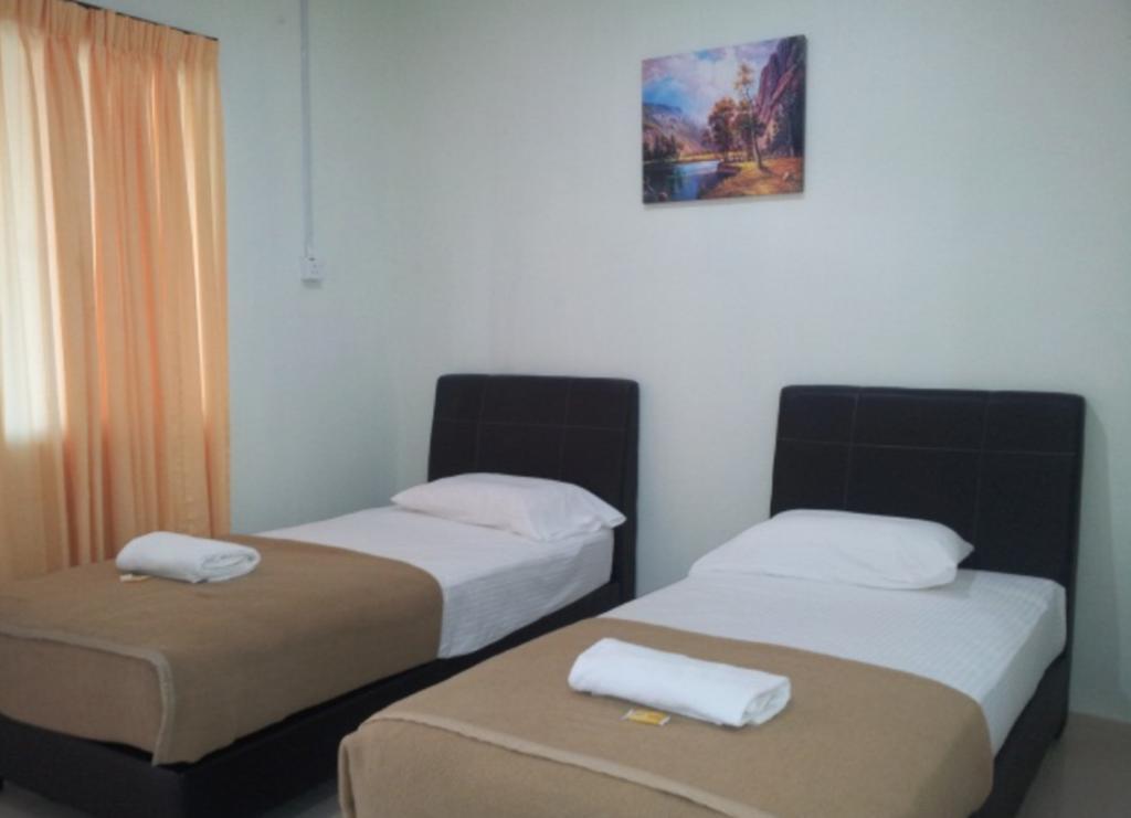 Huda Inn Pantai Cenang (Langkawi) Quarto foto